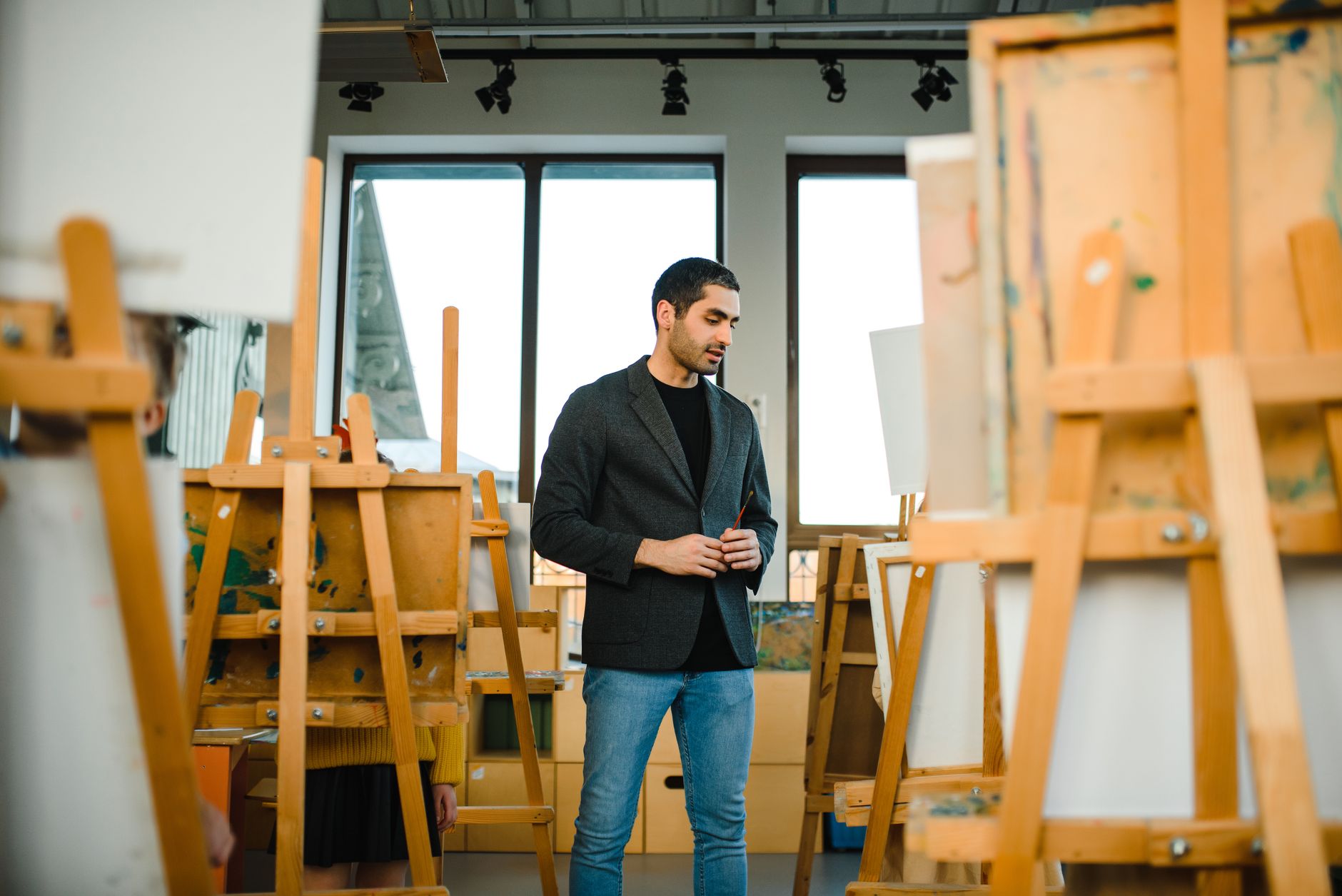 A robot artist gets sent to its room